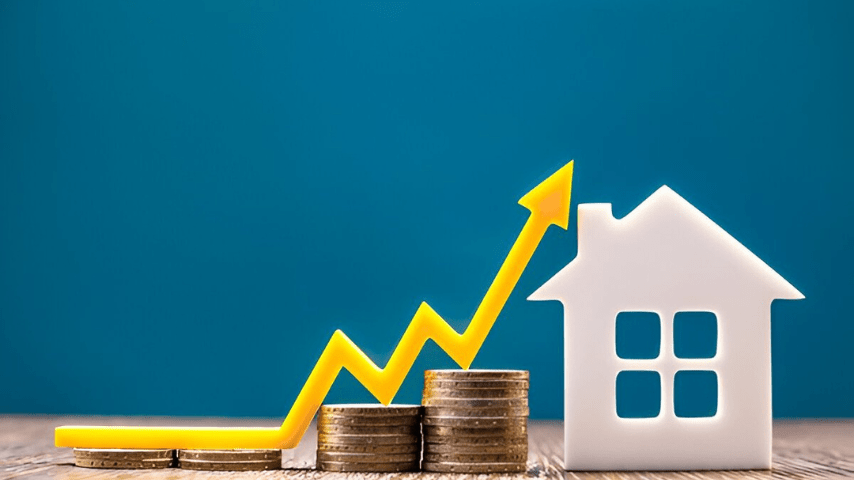 An image representing a house and coins alongside an upward arrow on a wooden table, showcasing investment potential in Bengaluru