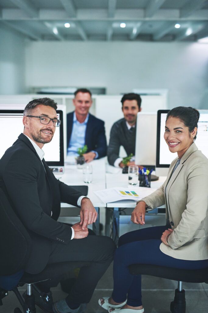 Success is the product of teamwork. Shot of corporate colleagues working together in their office.