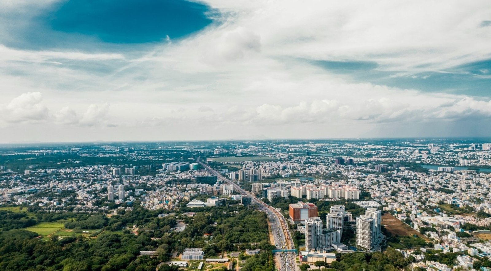 Hebbal vs Electronic City Bangalore skyline comparison showing residential growth and infrastructure developmen